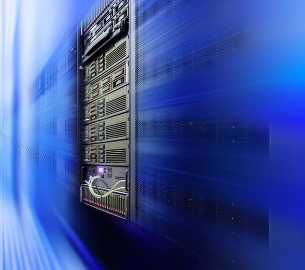 Blade server close-up in series of mainframes data center with motion and blur