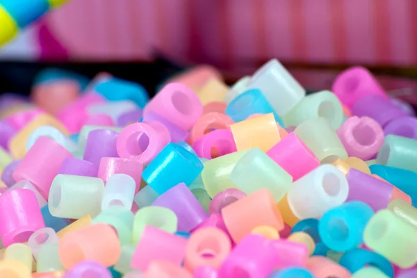 Close Up of pixel beads, plastic granules or plastic beads
