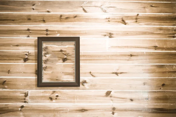 Wooden wall with wooden photo fix on the wall