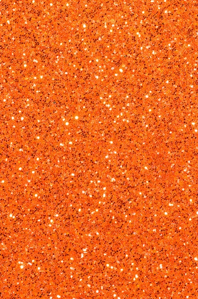 Orange glitter texture abstract background