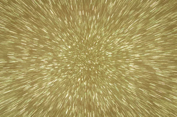 Golden glitter explosion lights abstract background