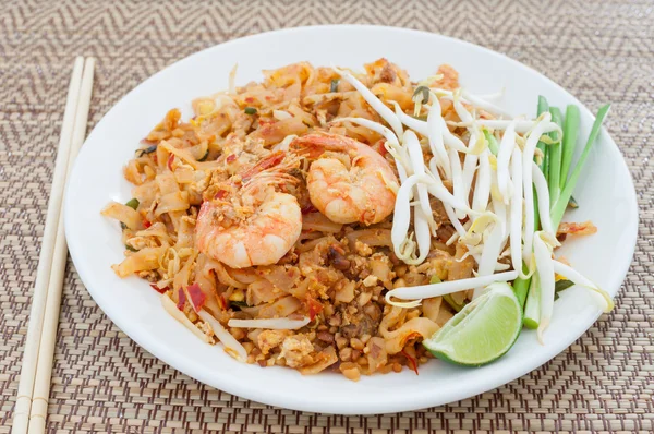 Fried noodles thai style with prawns (pad thai)