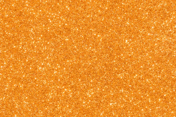 Orange glitter texture background