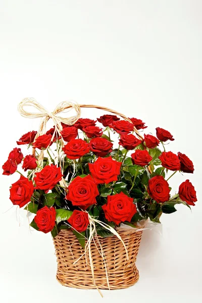 Beautiful red roses in a basket