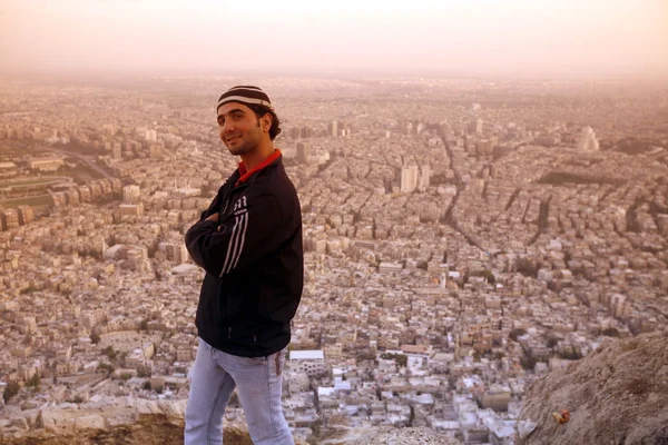 Man on rock above Damaskus