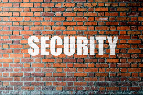 Red Brick wall texture with a word Security