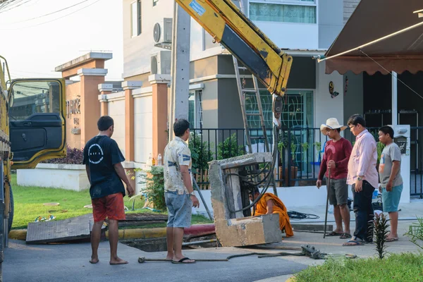 Working for drain cleaning