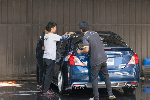 Washing blue car