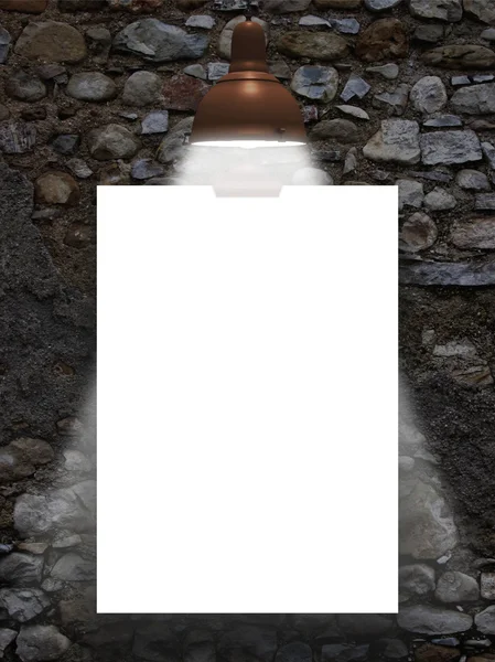 Single hanged paper sheet with retro lamp on ancient stone wall