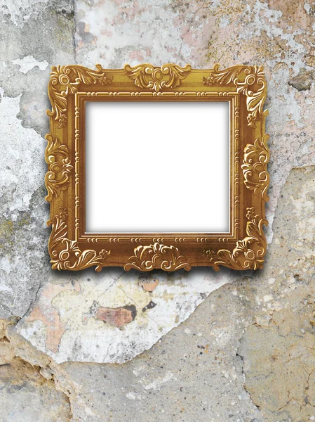 Single golden baroque frame on weathered marble wall