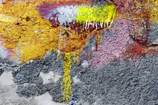 Abstract background concrete painted yellow and purple paint, we
