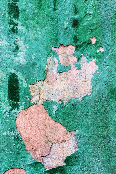 Abstract background concrete painted green paint, weathered with