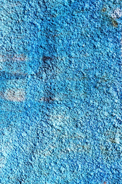 Hooligan smeared paint the walls of the old building. Landscape