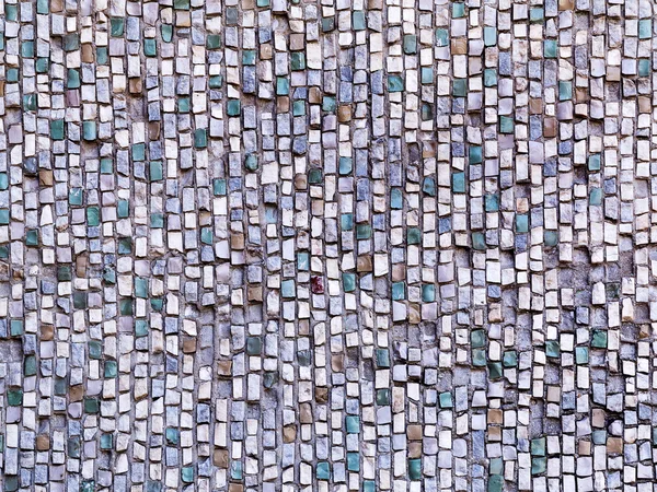 Old diagonal colorful mosaic texture on the wall. Landscape styl