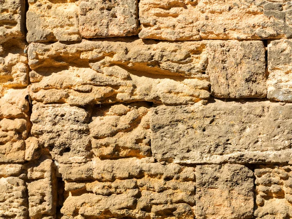 Abstract old stone wall with cracks and scratches. Landscape sty