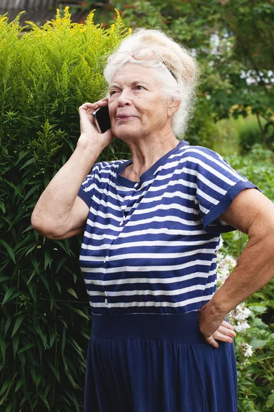 Senior woman calling on phone