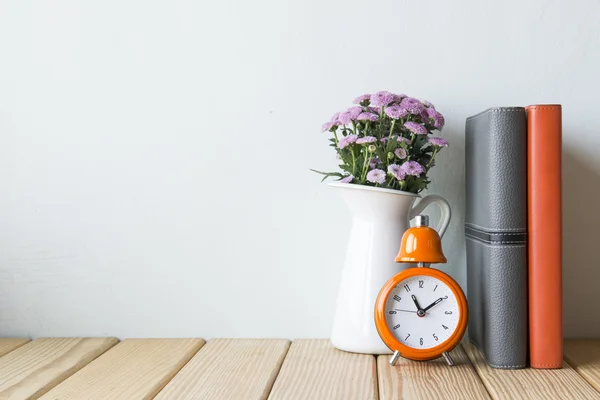 Interior decoration clock with wooden flooring plant