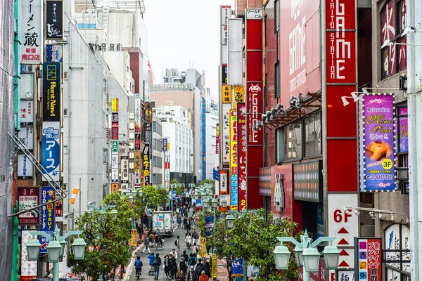 Pedestrians walk at Shibuya Crossing during the holiday season