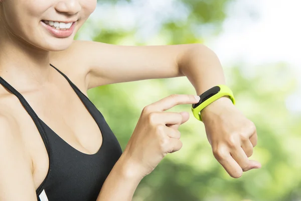 Health sport woman wearing smart watch device with touch