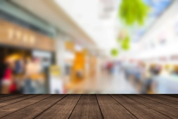 Empty wood table top with coffee shop blur with bokeh background,Product display template.
