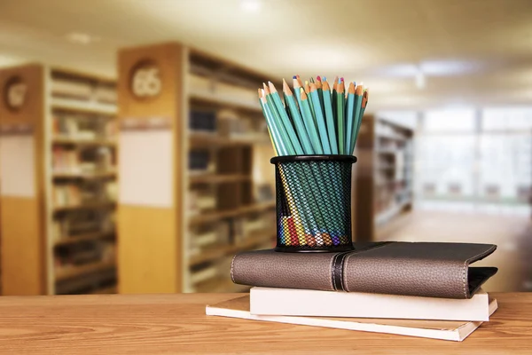 Empty wooden table and modern library background, product display