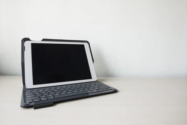 White tablet computer on white background