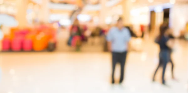 Blurred image of people walking at shopping mall , blur backgrou