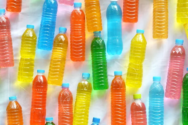 Colourful water in plastic bottle