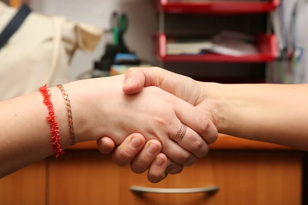 Handshake between two person