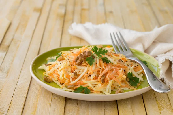 Celery salad with carrots, walnuts and parsley