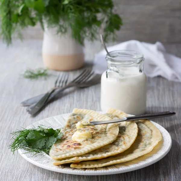 Flat bread with herbs, kutaby, traditional Azerbaijani dish