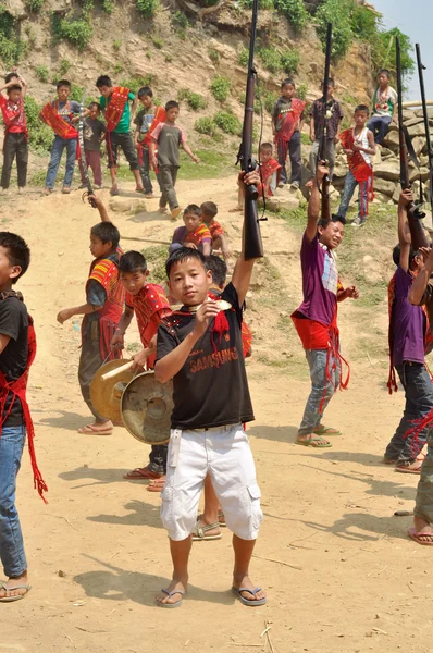 Young warriors with guns in Nagaland, India