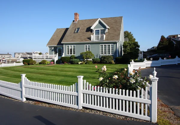 New England cottage white fence