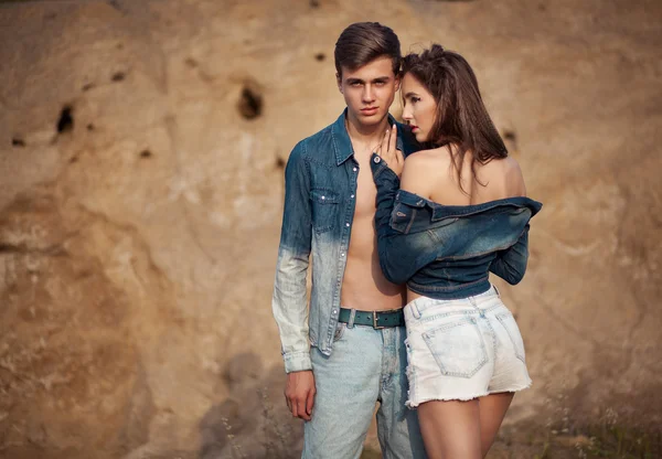 Sexy  couple in love wearing stylish trendy jeans clothes.