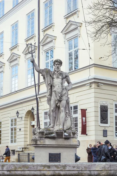 An ancient statue of Neptune in the central square of Lviv - Mar