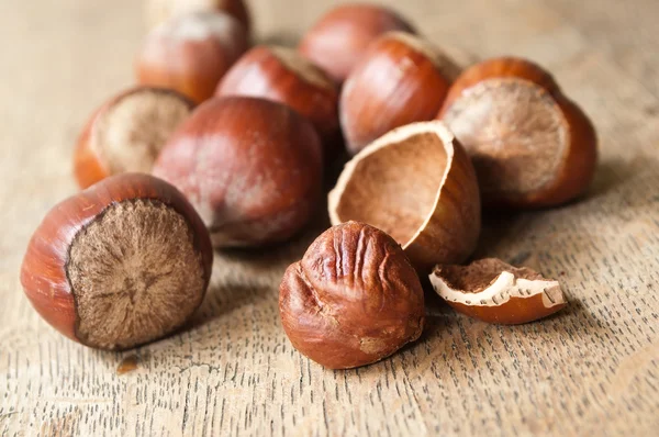 Closeup of nuts on wooden background