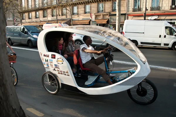 PARIS - France - 9 April 2015 - bike taxi city tour - Quay of Seine river