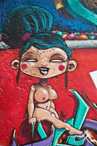 MULHOUSE - France - 07 June 2015 -  graffiti of sexy nude woman during the BOZAR graffiti festival - quay of sinners in Mulhouse