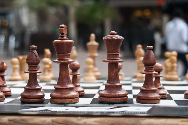 Chess game in outdoor closeup