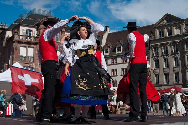 MULHOUSE - France - 19 September 2015 - traditional Alsatian  dancers in costume at the party harvest