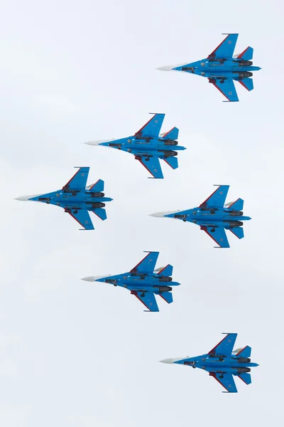 Aerobatics performed by aviation group of aerobatics Military-air forces Russian Knights on planes Su-27