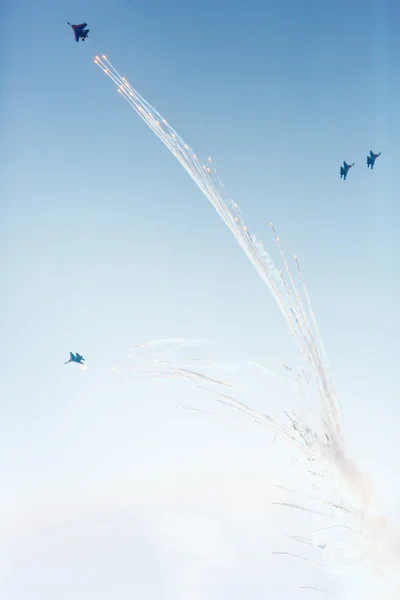 Aerobatics performed by aviation group of aerobatics Military-air forces Russian Knights on planes Su-27