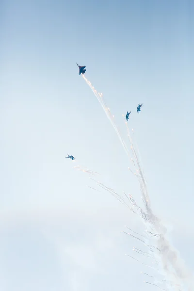 Aerobatics performed by aviation group of aerobatics Military-air forces Russian Knights on planes Su-27