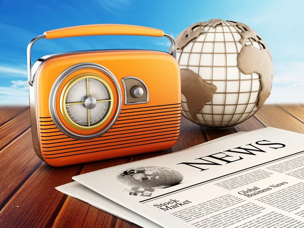 Vintage radio, newspaper and globe