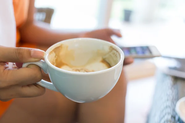 Lifestyle of women drinking coffee and using a mobile phone