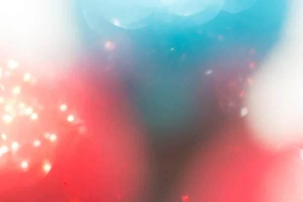 Red and blue background, abstract bokeh light celebration