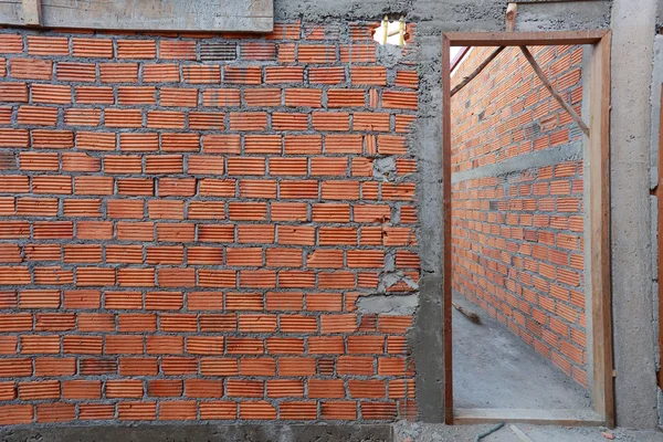Brick wall in residential building construction site