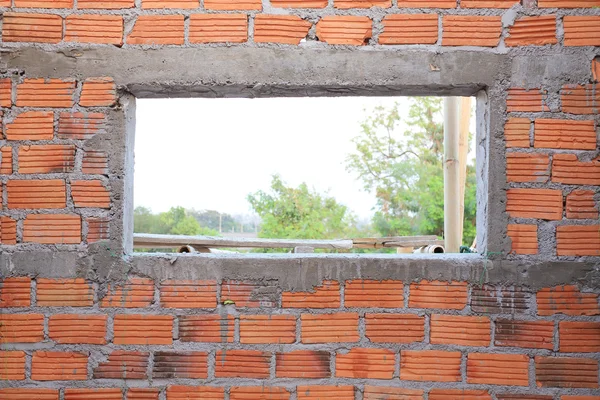 Brick wall in residential building construction site