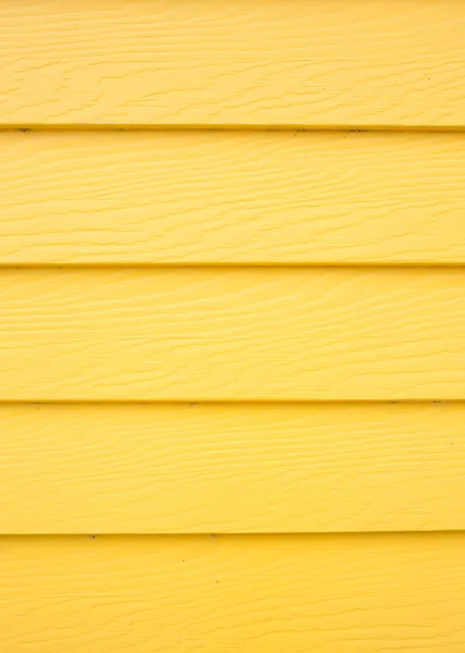 Yellow wood plank panel background
