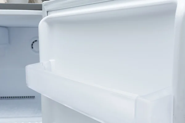 Empty refrigerator freezer